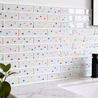 LumiWall 3D Decor Polka Dots 3D wall stickers installed as a kitchen backsplash above a marble countertop with a plant nearby