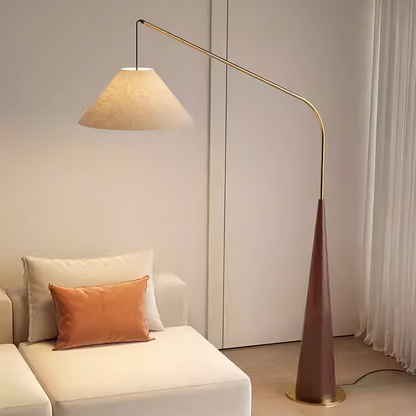 luxury arc standing lamp beside sofa in modern interior