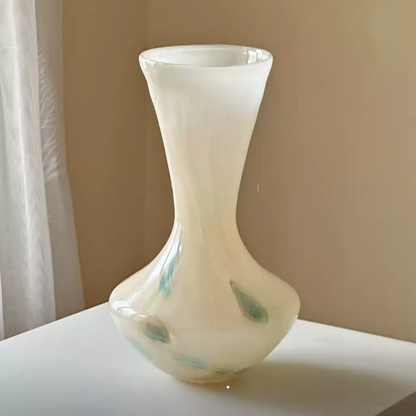 minimalist glass vase with organic flowing silhouette